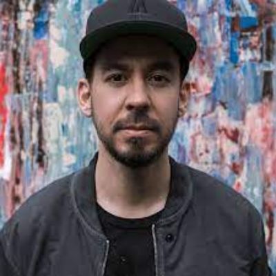 Mike Shinoda posing for a photo shoot